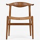 Roxy Klassik 
presents: 
Hans J. 
Wegner / 
Johannes 
Hansen.
JH 505 - 
'Cowhorn' chair 
in patinated 
oak with ...