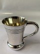 Antik Huset 
presents: 
Children's 
Mug Silver 
Designed by 
P.HERTZ.
