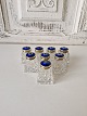 Karstens Antik 
presents: 
Set of 8 
crystal salt 
shakers with 
lids in gilded 
silver and 
enamel