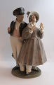 Lundin Antique 
presents: 
Royal 
Copenhagen. 
Porcelain 
figure. Hans & 
Trine. Model 
1783. Height 24 
cm. (2 quality)