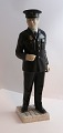 Lundin Antique 
presents: 
Bing & 
Grondahl. 
Porcelain 
figurine. 
Police officer. 
Model 2436. 
Height 31.5 cm. 
(1 ...