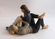 Lundin Antique 
presents: 
Royal 
Copenhagen. 
Porcelain 
figure. Young 
pair. Model 
4649. Length 19 
cm. (2 quality)