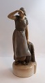 Lundin Antique 
presents: 
Bing & 
Gröndahl. 
Porcelain 
figure. Woman 
with fishing 
net. Model 
2036. Height 26 
cm. ...