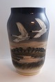 Lundin Antique 
presents: 
Royal 
Copenhagen. 
Porcelain vase 
with swans. 
Model 
1955/1217. 
Height 25 cm. 
(2 quality)