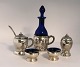 Lundin Antique 
presents: 
Danish 
work. Silver 
(830). 2 salt 
jars with 
spoons, pepper 
shaker, mustard 
jar and ...
