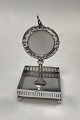 Danam Antik 
presents: 
Watch 
holder in 
silverplating