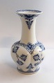 Lundin Antique 
presents: 
Royal 
Copenhagen. 
Blue fluted, 
half lace. 
Vase. Model 
1205. Height 16 
cm. (2 
quality).