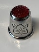 Antik Huset 
presents: 
Finger 
ring of 
sterling silver 
with red glass.