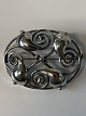 Antik Huset 
presents: 

Silver 
brooch with 
vibrant 
pattern, 
stamped H.Gs 
830