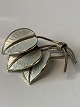 Antik Huset 
presents: 
Silver 
brooch with 
white enamel, 
925 sterling 
silver. Stamped 
A. SGH Norway.