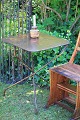 K&Co. presents: 

Old French 
café table in 
polished metal 
and wrought 
iron with a 
really nice 
patina...