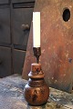 K&Co. presents: 
Antique 
Swedish 
candlestick 
from the 19th 
century in wood 
and candle 
holder in 
wrought iron...