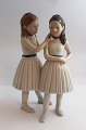 Lundin Antique 
presents: 
Royal 
Copenhagen. 
Porcelain 
figure. Ballet 
girls. Model 
135. Height 21 
cm. (1 quality)