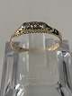 Antik Huset 
presents: 

Gold ring 
in 14 carat 
gold, with 
three diamonds, 
stamped EC 585. 
Ring size: 58