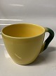 Antik Huset 
presents: 
Royal 
Copenhagen 
Ursula Coffee 
Cup in Yellow
Dec. no. 072