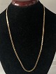 Antik Huset 
presents: 
Armor 
facet-like 
necklace, in 8 
karat gold.
Length: 49 cm.