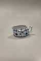 Danam Antik 
presents: 
Royal 
Copenhagen Blue 
Fluted Creamer 
No. 435