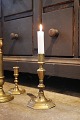 K&Co. presents: 
18th 
century 
candlestick in 
brass with a 
really nice 
patina...