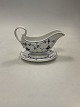 Danam Antik 
presents: 
Royal 
Copenhagen Blue 
Fluted Plain 
Saucebowl with 
handle and 
saucer No 200