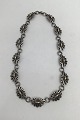 Danam Antik 
presents: 
Georg 
Jensen Sterling 
Silver /18 kt 
Gold Necklace 
No. 394