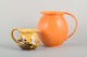 L'Art presents: 
Svend 
Hammershøi 
(1873–1948) for 
Kähler
Two glazed 
ceramic jugs.