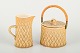 L'Art presents: 
Jens H. 
Quistgaard 
(1919–2008) for 
Bing & Grøndahl 
/ Nissen 
Kronjyden
Relief cream 
jug and ...