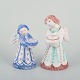 L'Art presents: 
Two Hjorth 
ceramic 
candlesticks in 
the shape of 
angels, 
executed in 
glazed faience.