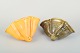 L'Art presents: 
Two Kähler 
ceramic wall 
vases shaped 
like seashells.