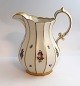 Lundin Antique 
presents: 
Royal 
Copenhagen. 
Henriette. 
Water jug. 
Model 444-8526. 
Height 19 cm. 
(1 quality).