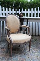 K&Co. presents: 
A pair of 
French 18th 
century Louis 
XVI armchairs 
with remnants 
of the original 
grey-blue 
colour...
