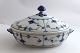 Lundin Antique 
presents: 
Royal 
Copenhagen. 
Blue fluted, 
plain. Oval 
lidded 
dish.Model 283. 
Length 27.5 cm. 
...