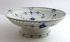 Lundin Antique 
presents: 
Bing & 
Grondahl. Blue 
painted. Round 
bowl on foot 
with lace 
border. Model 
428.6. ...