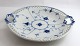 Lundin Antique 
presents: 
Bing & 
Grondahl. Blue 
painted. Round 
cake plate with 
lace border. 
Model 304.6. 
...
