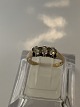 Antik Huset 
presents: 
8 carat 
gold, Women's 
ring with 3 
clear stones.
Ring size 50.