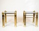 Osted Antik & 
Design 
presents: 
Set of Two 
Bedside Tables 
- Brass Legs - 
Black Glass Top 
- Vintage Style 
- 1970s
