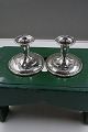 Antikkram 
presents: 
Pair of 
swedish 
candlesticks 
7cms on round 
stand of 830S 
silver