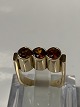 Antik Huset 
presents: 
14 karat 
gold, Ladies 
ring with 3 
Orange stones.
Ring size 52.
