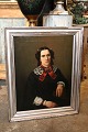 K&Co. presents: 
Old oil 
painting from 
the mid-19th 
century, 
portrait of a 
woman in a 
silver frame...