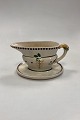Danam Antik 
presents: 
Aluminia 
Guldregn 
(Laburnum) 
Sauce Bowl with 
solid base No. 
10/189