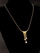 Middelfart 
Antik presents: 

18 carat 
gold pendant