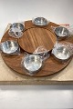 Danam Antik 
presents: 
Stelton 
Lazy Susan 
Fondue 
turntable with 
6 Stainless 
steel bowls