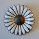 Pegasus – Kunst 
- Antik - 
Design 
presents: 
Marguerite 
in sterling 
silver/enamel. 
Anton 
Michelsen, 20th 
century, ...