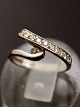 Middelfart 
Antik presents: 

14 carat 
white gold ring 
size 48 with 
several 
diamonds