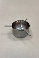 Danam Antik 
presents: 
Stelton 
Cylinda-line 
Tea Strainer in 
stainless steel