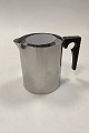 Danam Antik 
presents: 
Stelton 
Cylinda-line 
stainless steel 
water jug with 
lid