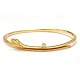 Aabenraa 
Antikvitetshandel 
presents: 
An oval 
18kt gold 
"Snakes"-bangle 
by Ole 
Lynggaard, 
Copenhagen. 
Size ...