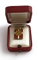 Lundin Antique 
presents: 
Georg 
Jensen. Gold 
14K king's mark 
(585). 
1870-1945. In 
box.