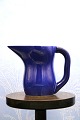 K&Co. presents: 
Oval 
Ursula faience 
milk jug from 
RC designed by 
Ursula 
Munch-Petersen. 
442...