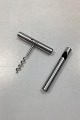 Danam Antik 
presents: 
Stelton 
Cylinder-line 
APV Bottle 
Opener Set in 
stainless steel