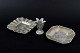 L'Art presents: 
Just 
Andersen 
(1884–1943)
Pewter. Vase 
and two 
ashtrays.